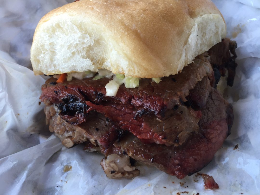 1/2 lb Brisket Sandwich with slaw Jalapeño Bucks